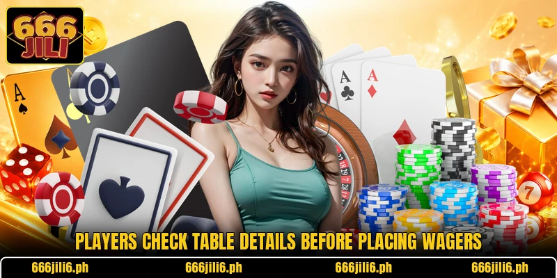 Players check table details before placing wagers Players check table details before placing wagers